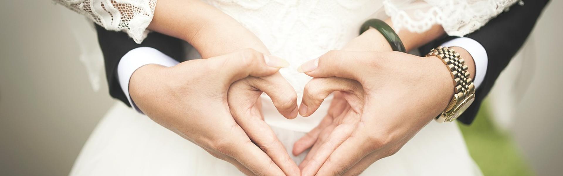 wedding couple with love heart hands